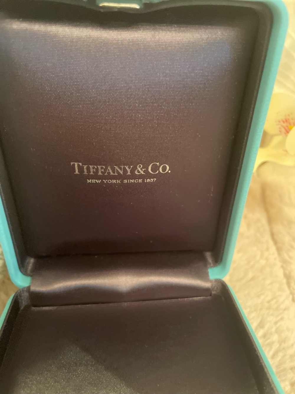 Tiffany & Co. turquoise box with navy satin interior